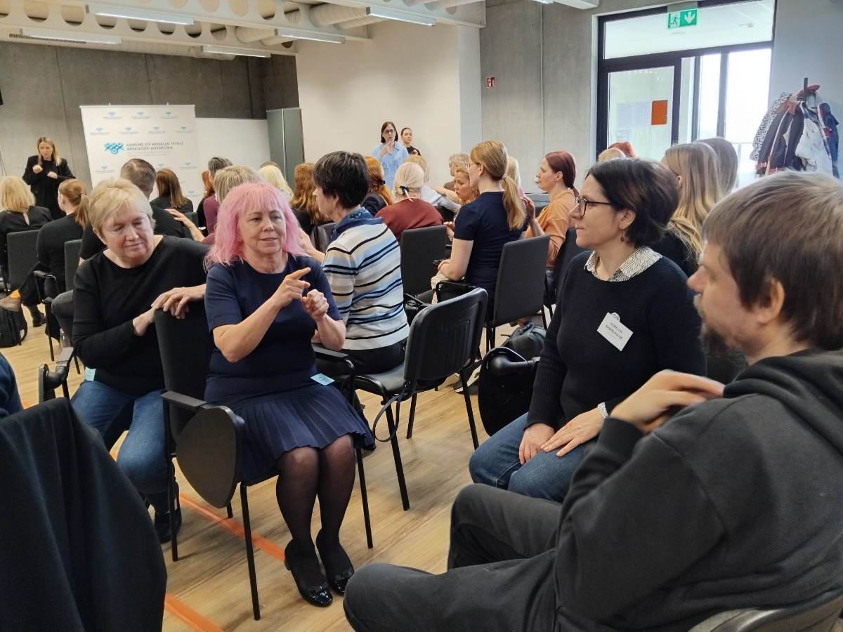 People practising sign language