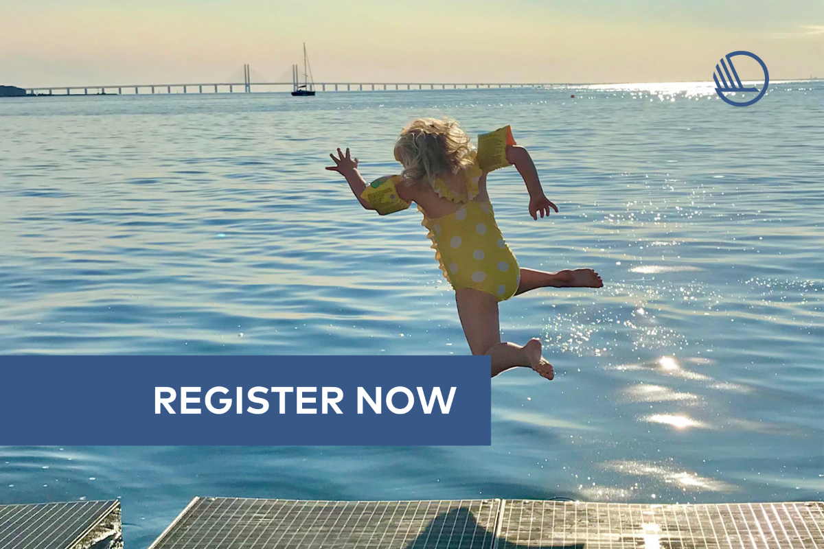 Young girl jumping into water from a bridge in sunshine.