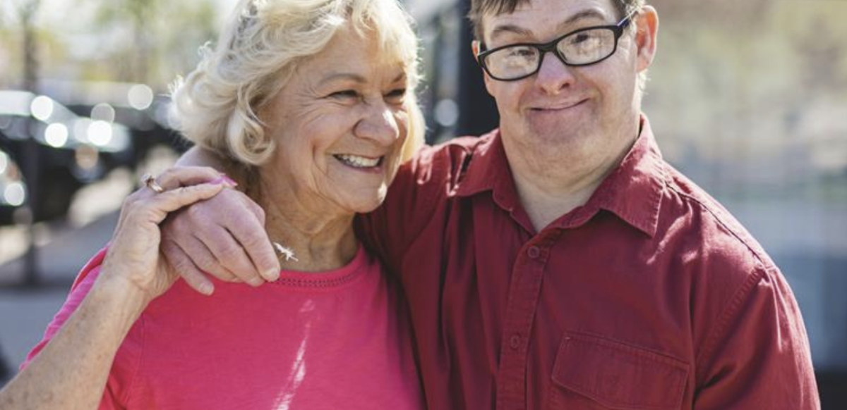 Older women with a man smiling